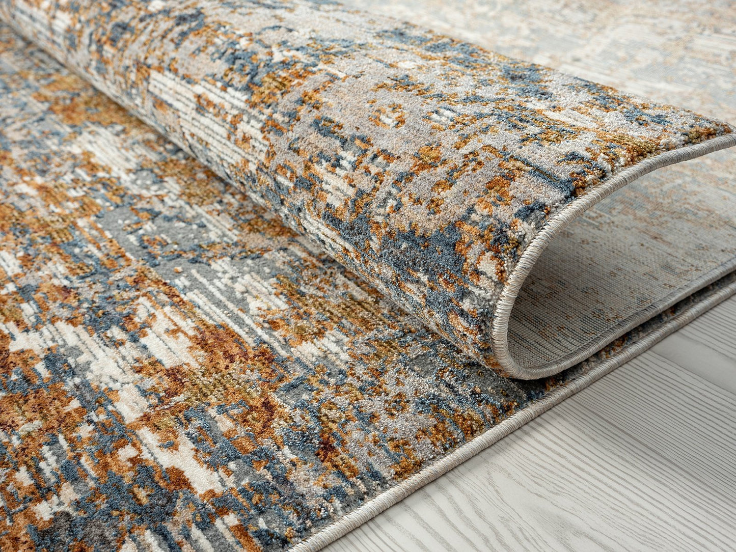Camilla Blue and Rust Tones Abstract Area Rug